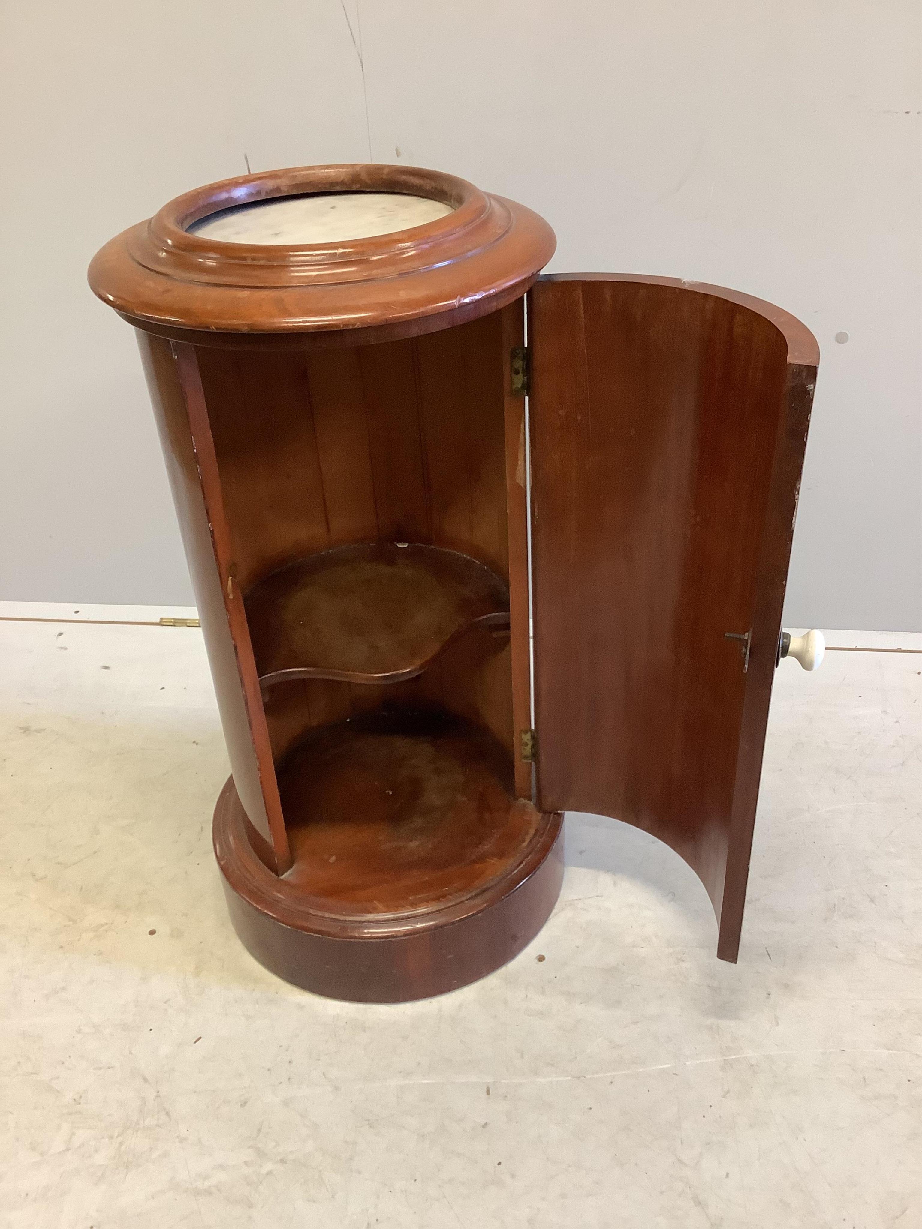 A Victorian mahogany cylindrical marble topped bedside cabinet, diameter 38cm, height 75cm. Condition - fair